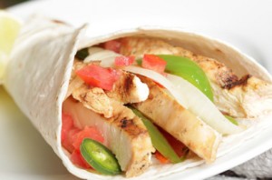 Spicy chicken fajitas with tortillas